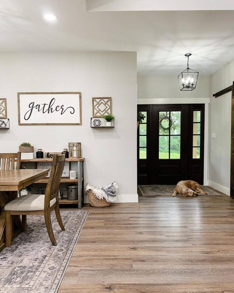SW Agreeable Gray dining room adjacent to the entryway