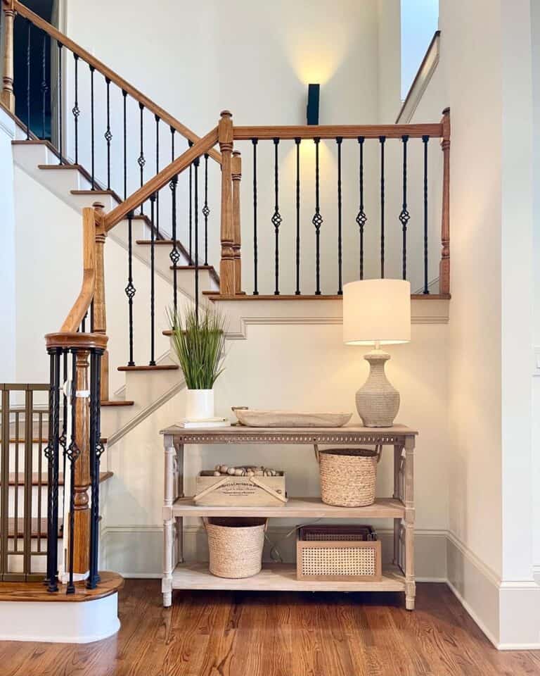 Traditional Entry Way With Iron Stair Spindles