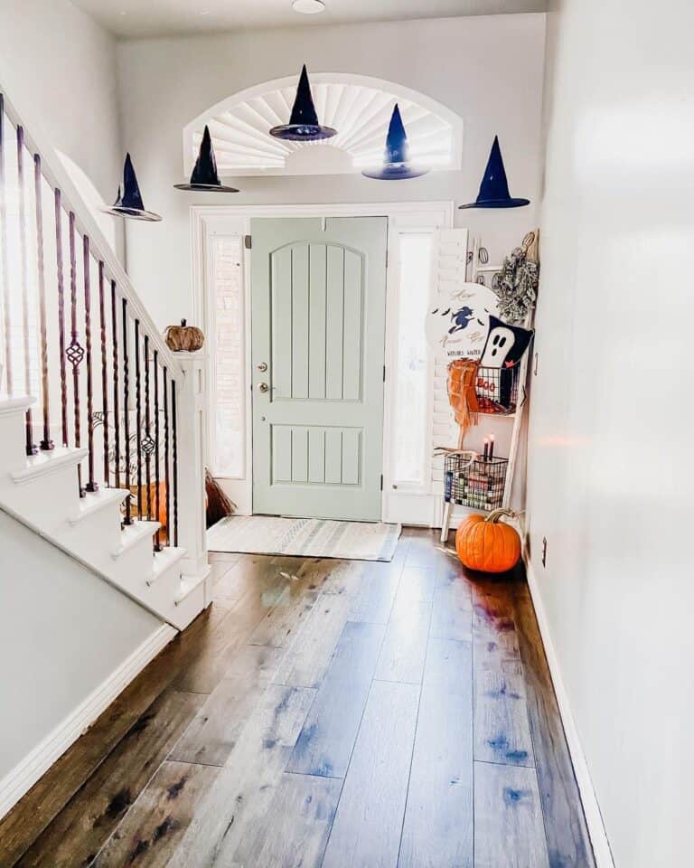 Entryway Staircase with Iron Spindles