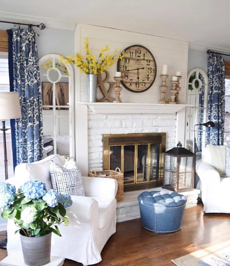 White Brick Fireplace with Gold Doors