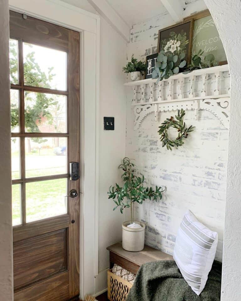 Entryway With Limewashed Brick Wall