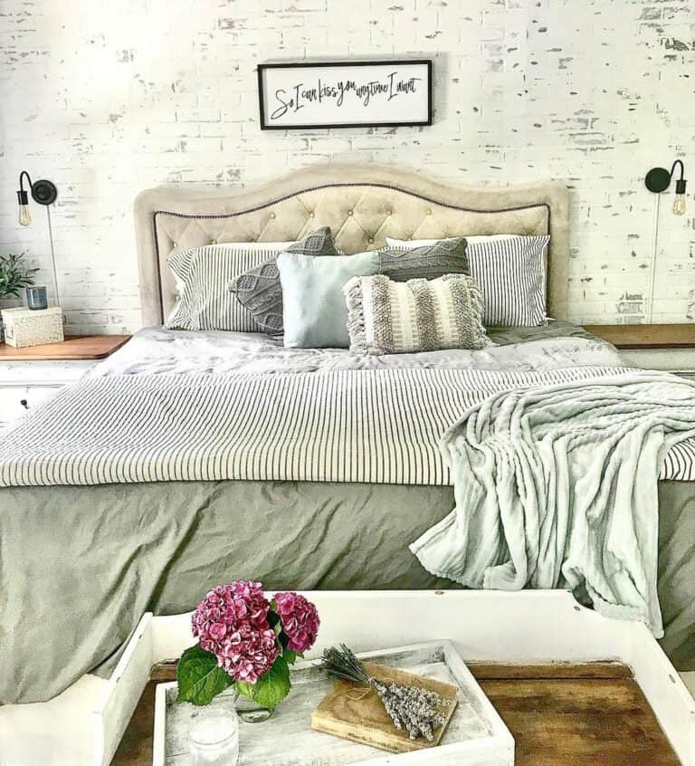 Bedroom With Rustic White Brick Wall