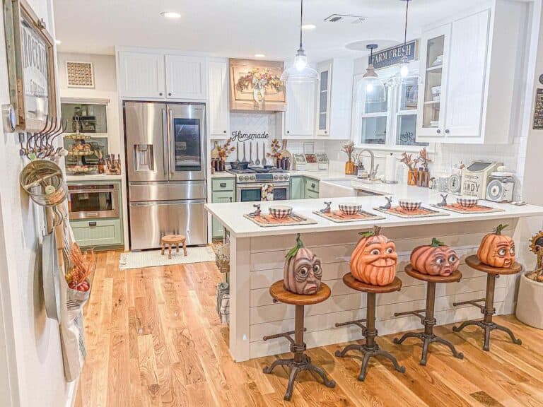 Decorative Pumpkins and a U Shaped Kitchen Peninsula