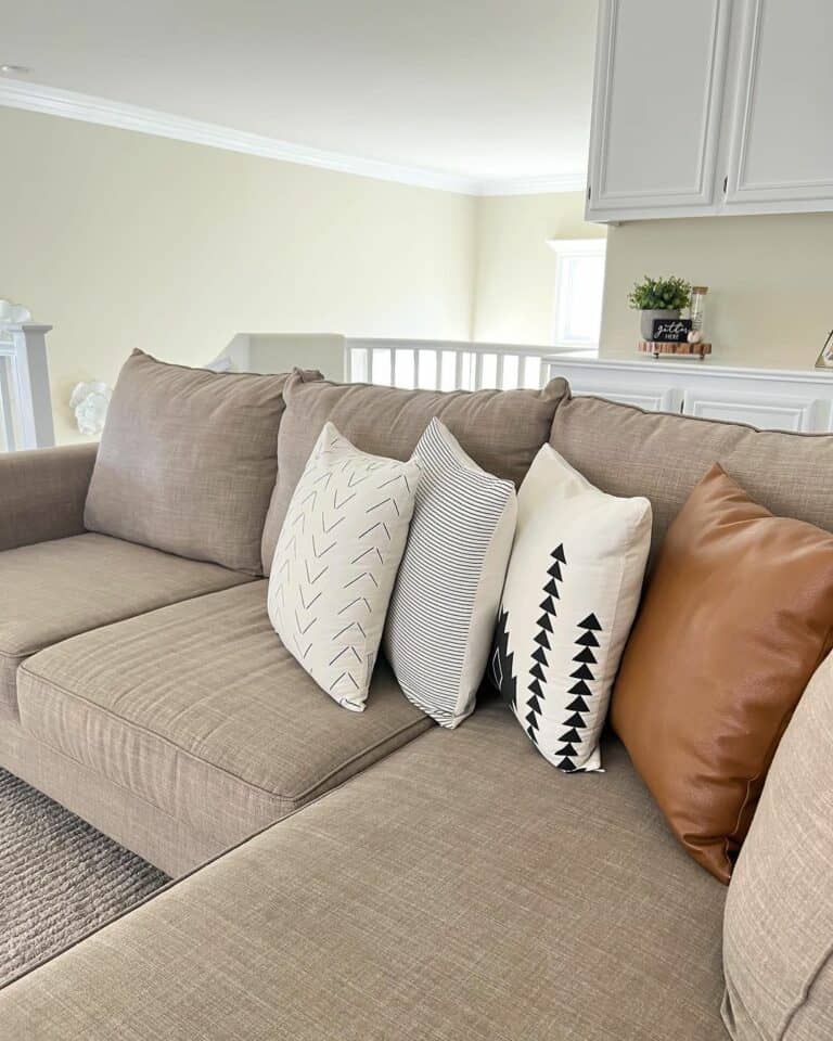 Layered Pillows on Heathered Couch