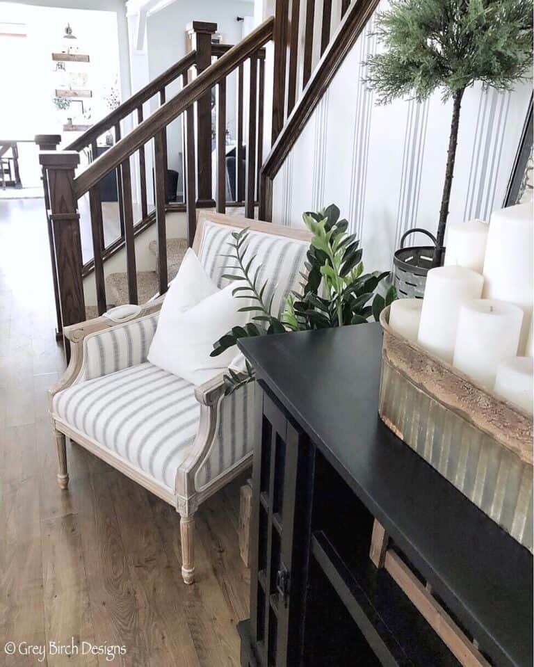 Dark Wood and Striped Wallpaper Staircase