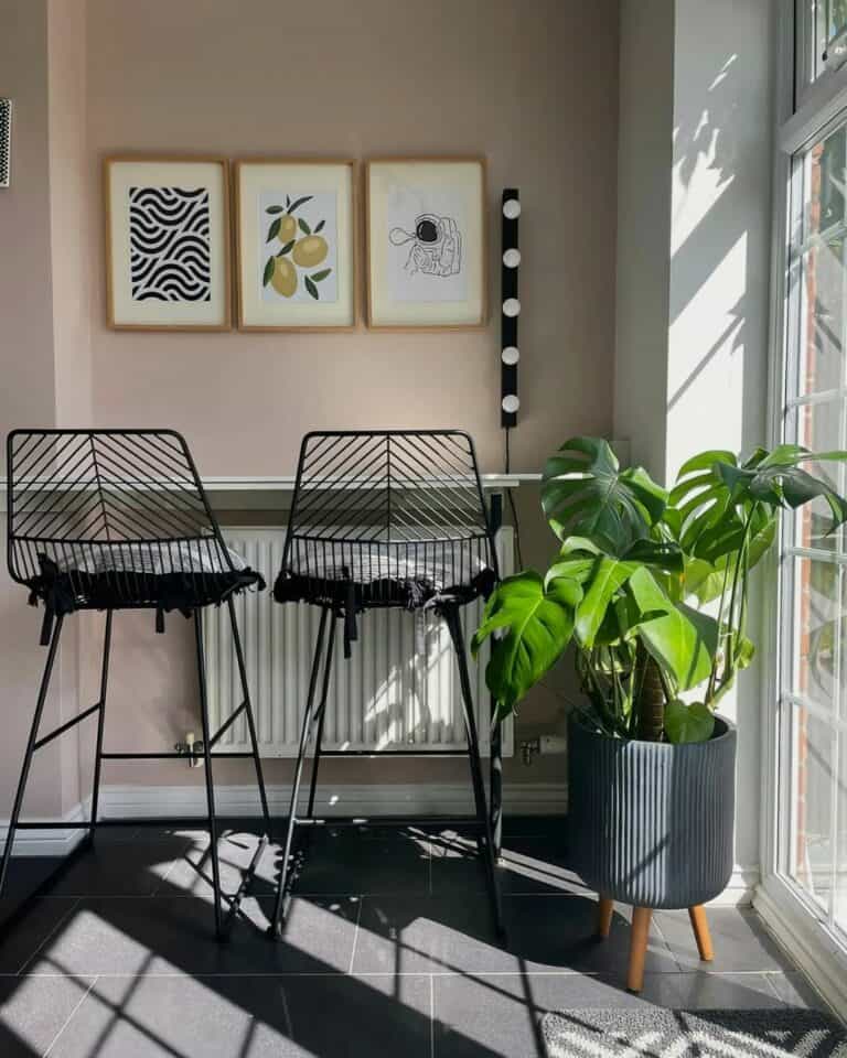 Bar Seating Beside a Wall-mounted Table