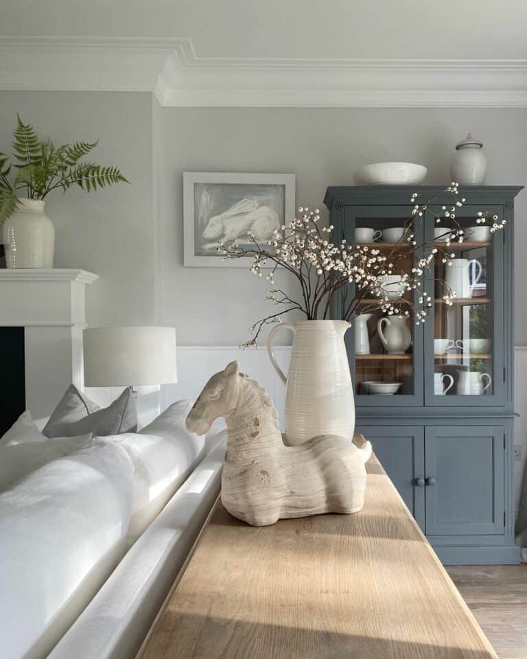 White Living Room With Natural Wood Sofa Table