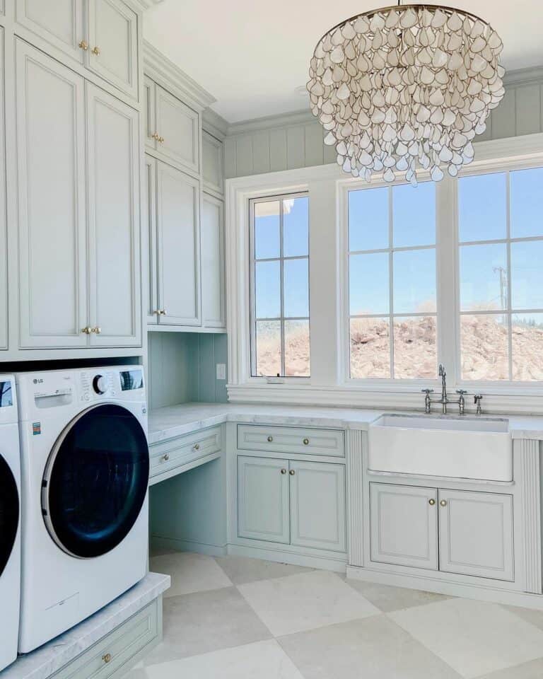 Neutral Cabinetry With Seashell Chandelier