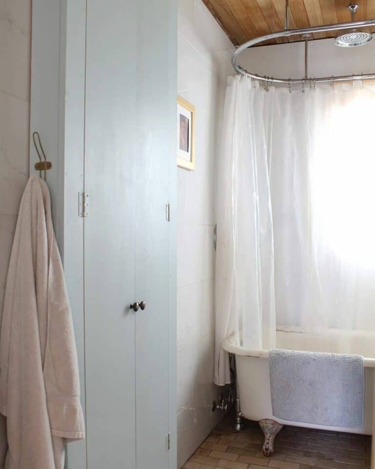 Farmhouse Bathroom With Thin Cabinets