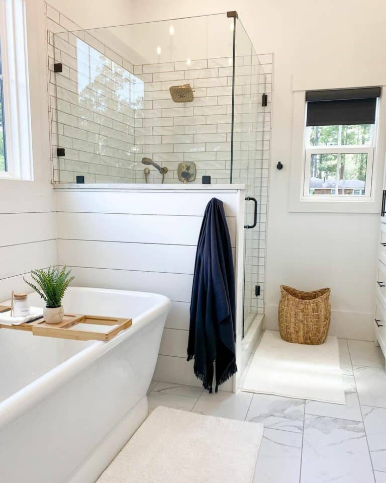 White Tiled Shower with Marble Curb