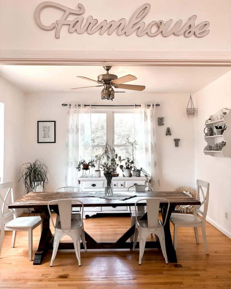 Rustic Farmhouse Dining Room With Wood Table