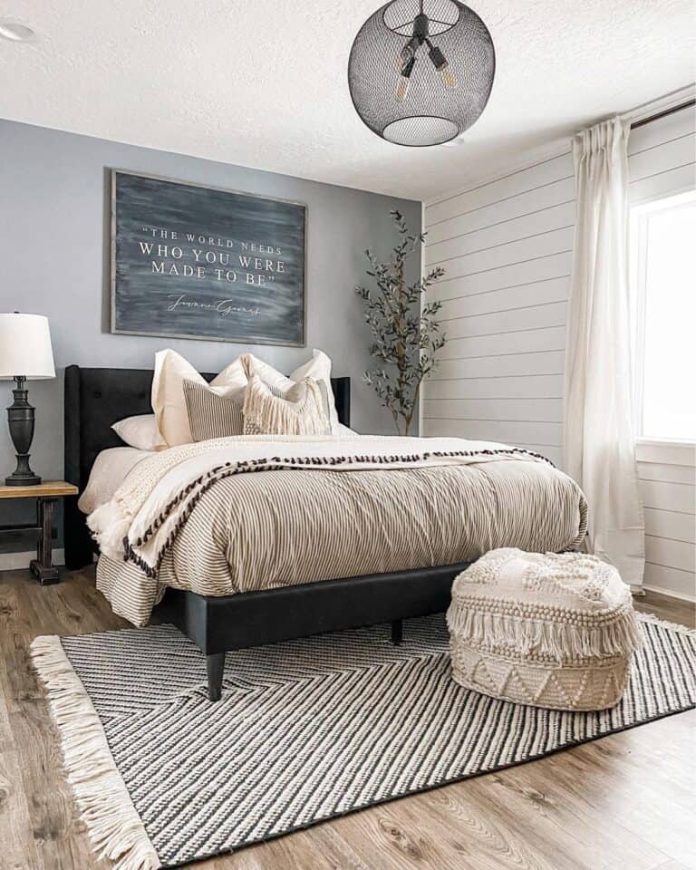 Textured Beige Pouf on a Black and White Rug