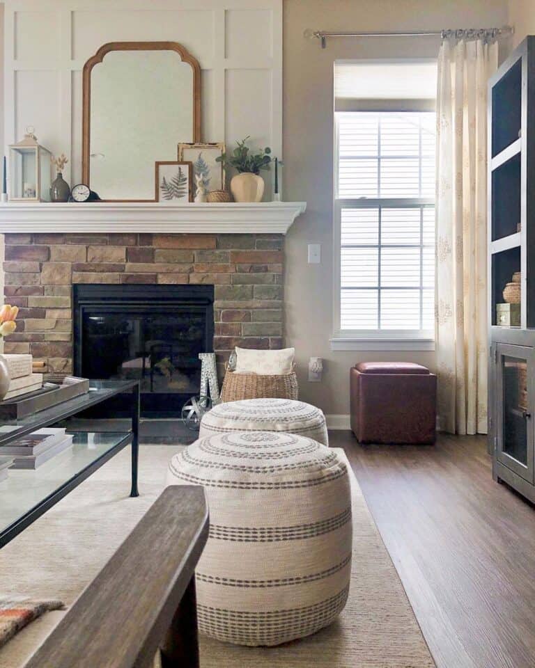 Round Farmhouse Poufs Near a Glass Coffee Table