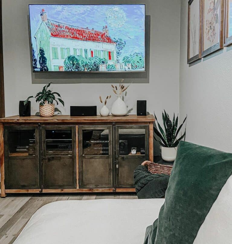 Stained Wood TV Cabinet With Black Metal Doors