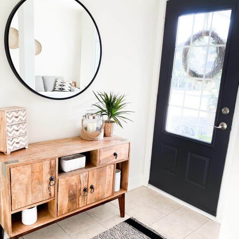 Green Plant on a Wood Console Table
