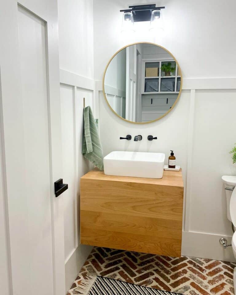 Modern Powder Room With Herringbone-patterned Floor Tiles