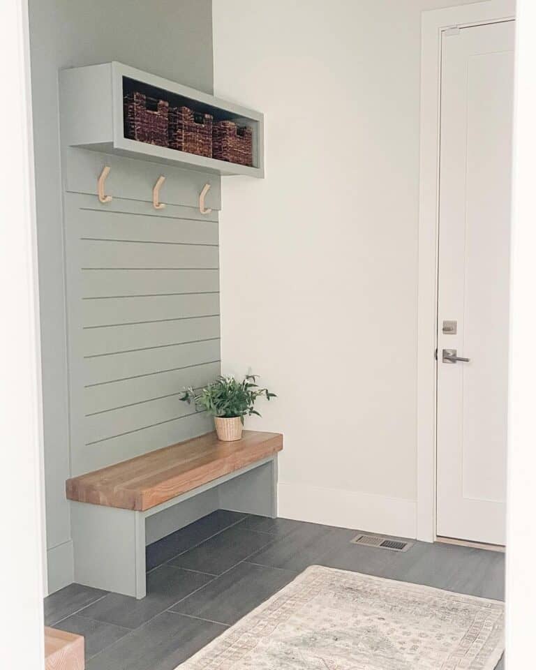 Light Green Bench Atop Gray Tile