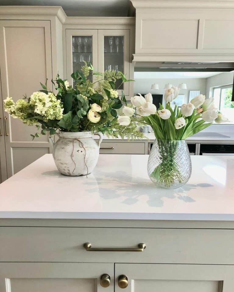 Inspiration for an All-White Kitchen With Clear Glass Décor