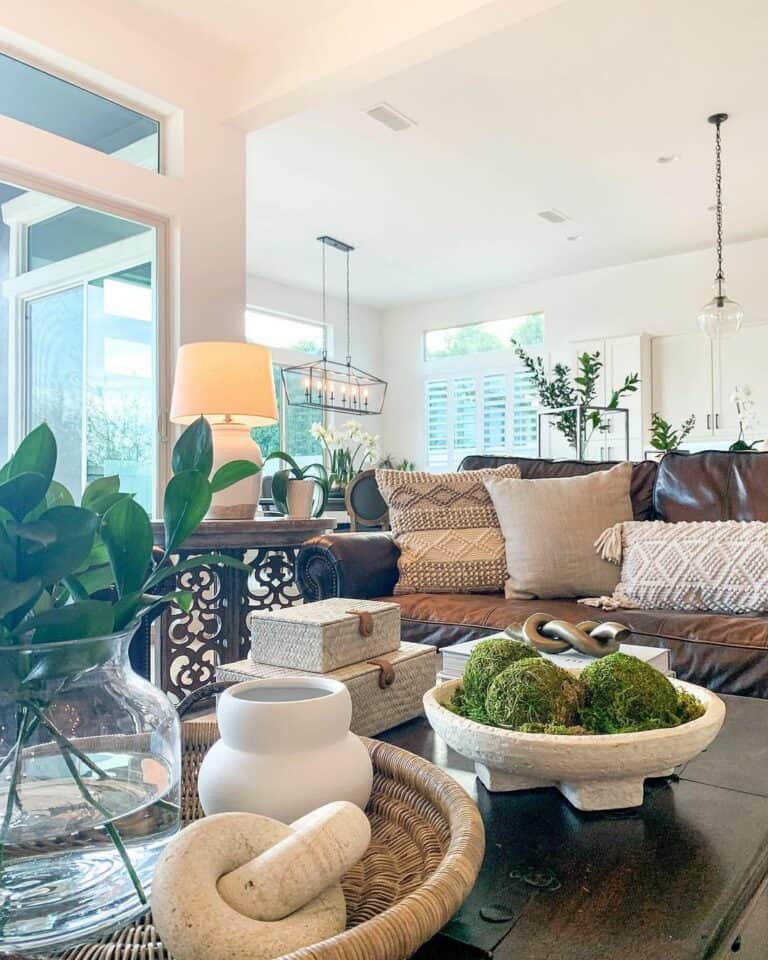 Neutral Coffee Table Décor With a Clear Glass Centerpiece