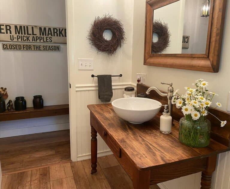Wooden Table Used as a Bathroom Vanity