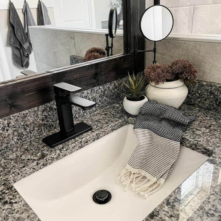 Vanity Mirror Above a Granite Countertop