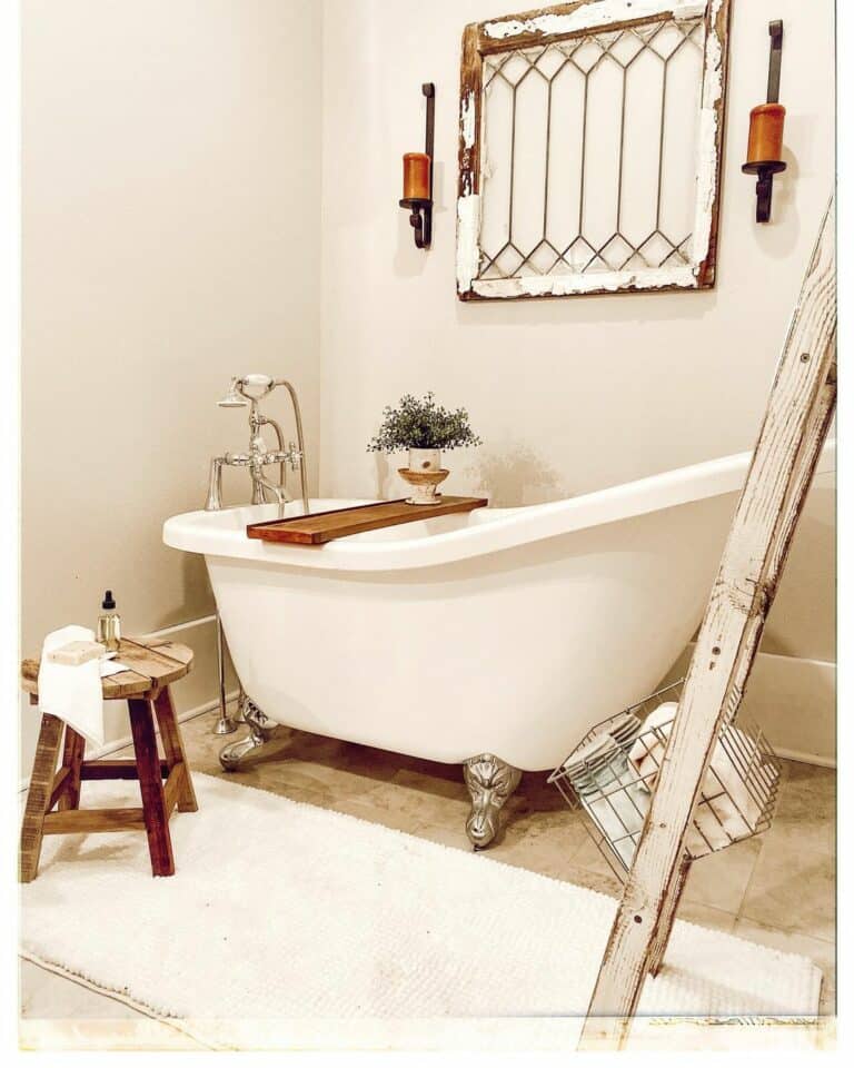 Neutral Bathroom Features a Clawfoot Bathtub