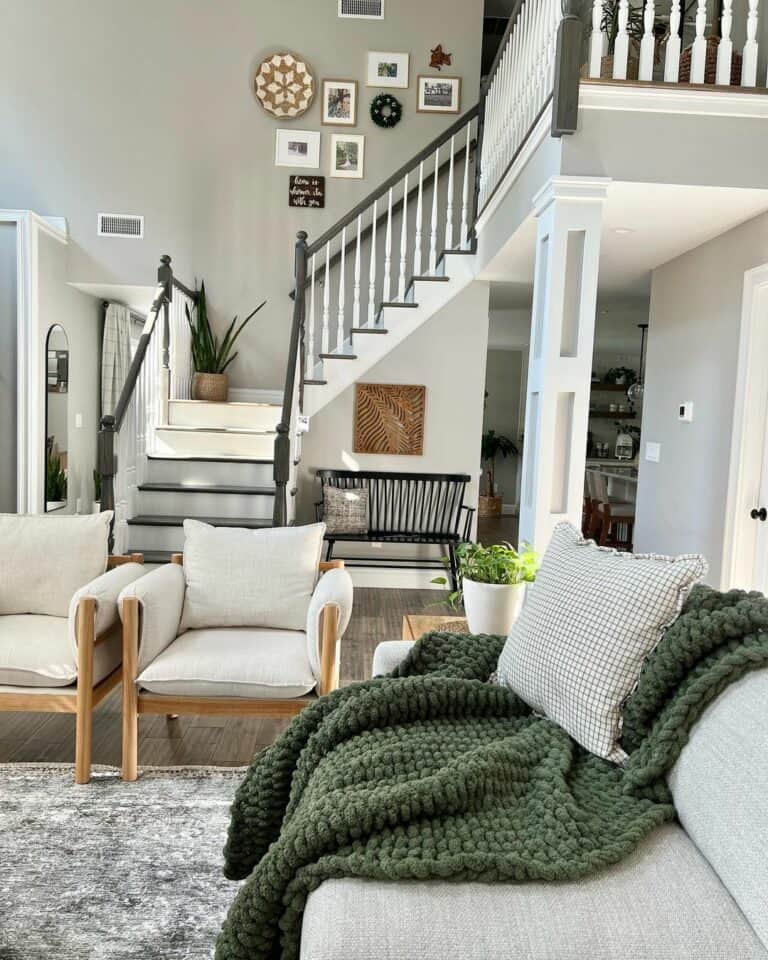 Grey Checkered Pillow on a Green Chunky Knit Blanket