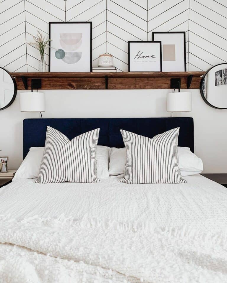 Pictures in Black Frames and a White Herringbone Accent Wall