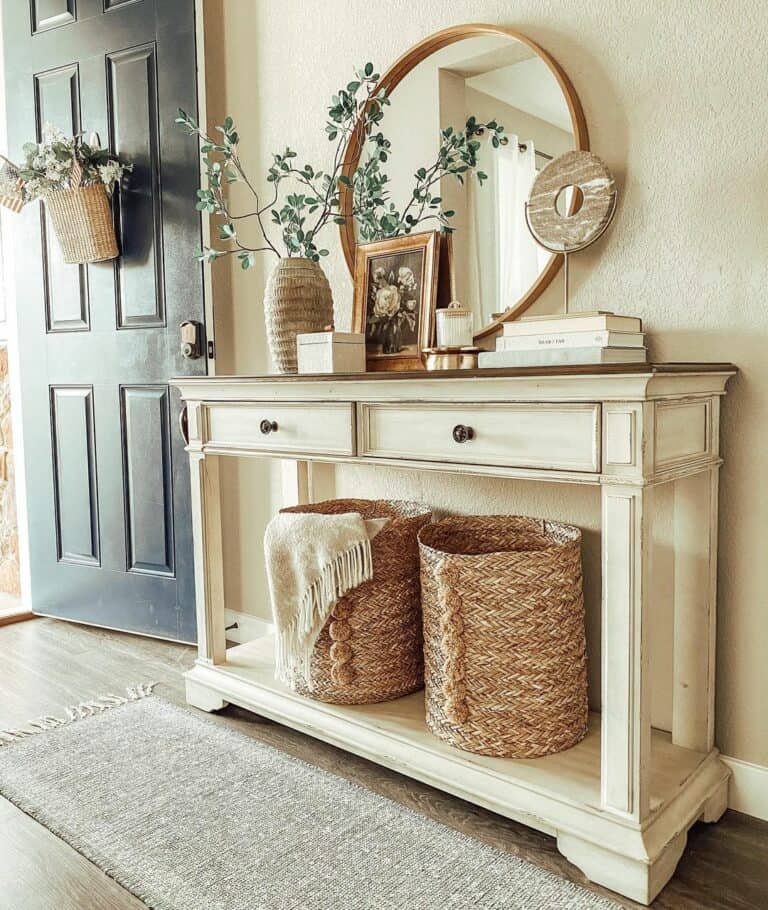 Entryway With Vintage Gray Rug and Greenery