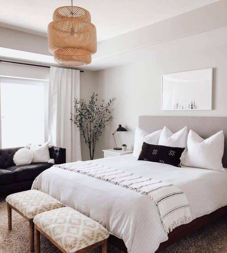 Bedroom Furnished with Sofa and Night Table