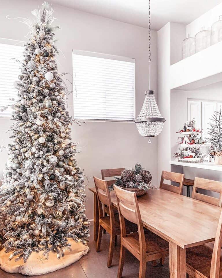 Wooden Dining Room Table under Glass Pendant Chandelier