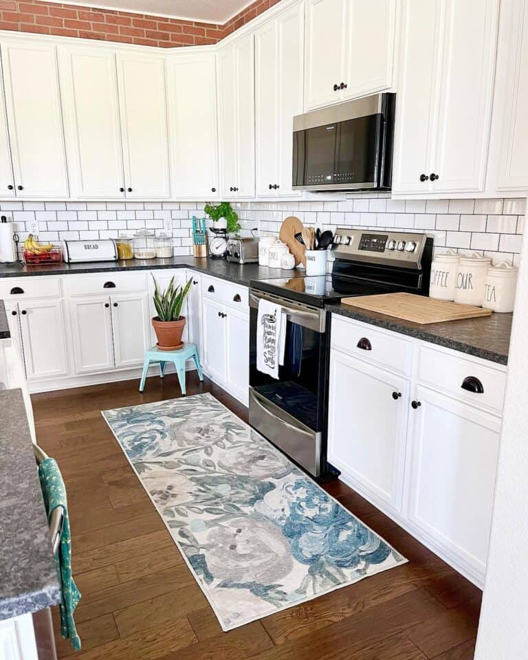 L-shaped Kitchen Cabinets with Dark Countertops