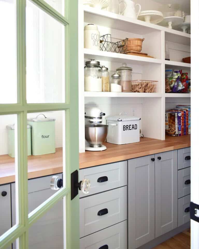 Black Hardware in a Bright Pantry