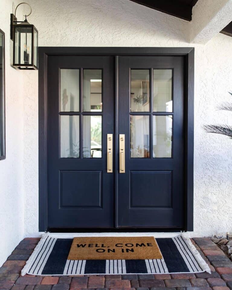 Double Black Front Doors with Gold Handles