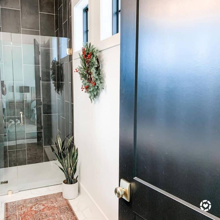 Black Tile Bathroom With White Grout