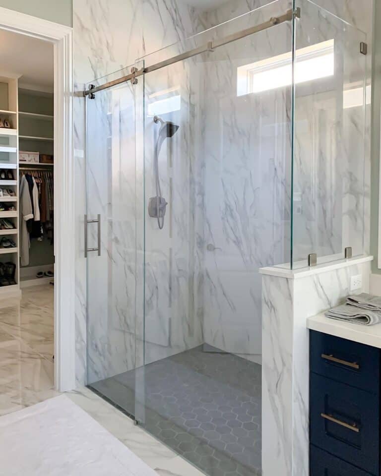 Small Window Inside Marble Slab Shower