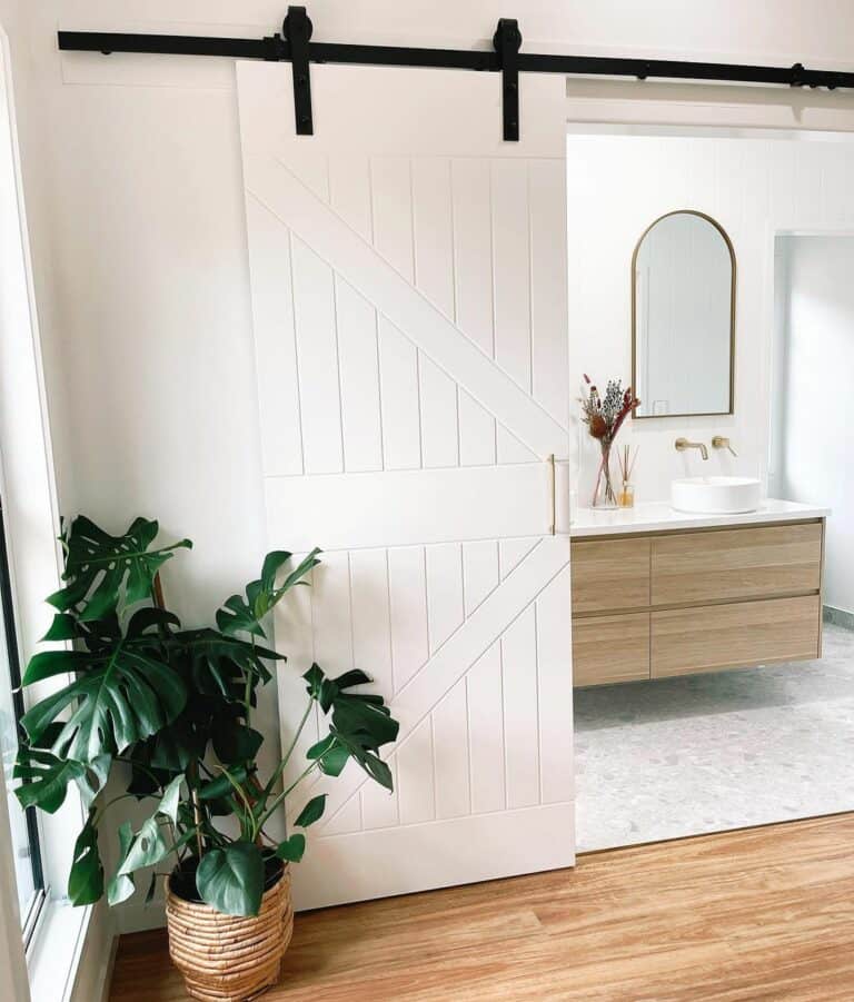 Sliding Barn Door Opens To Reveal Bathroom