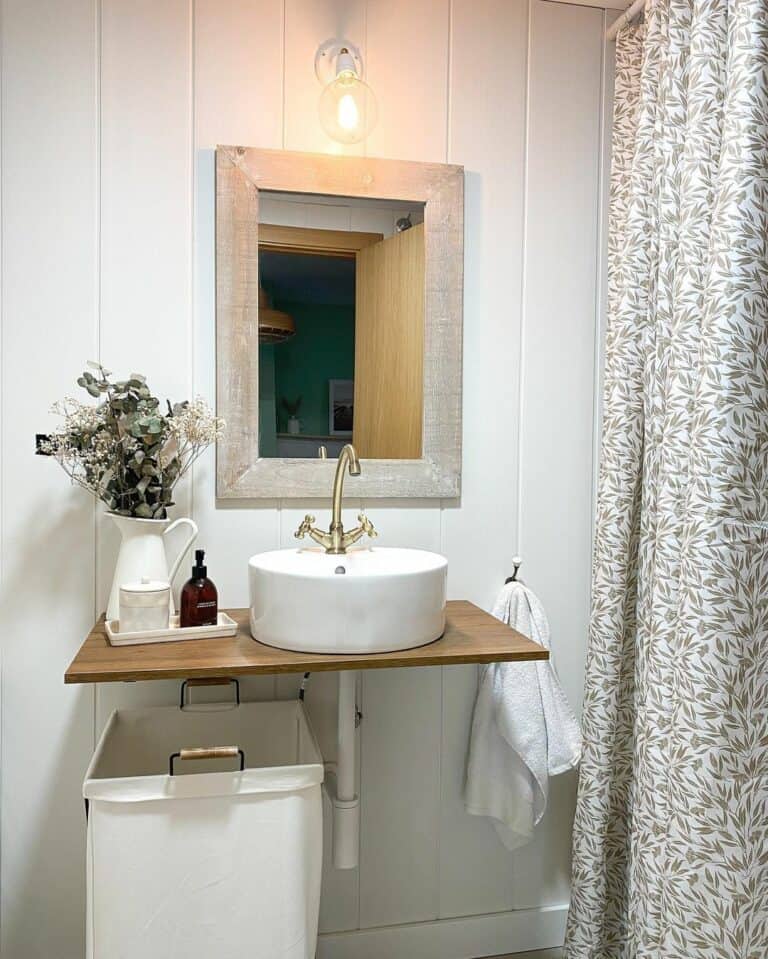 Wall Mounted Vanity With a Wooden Top
