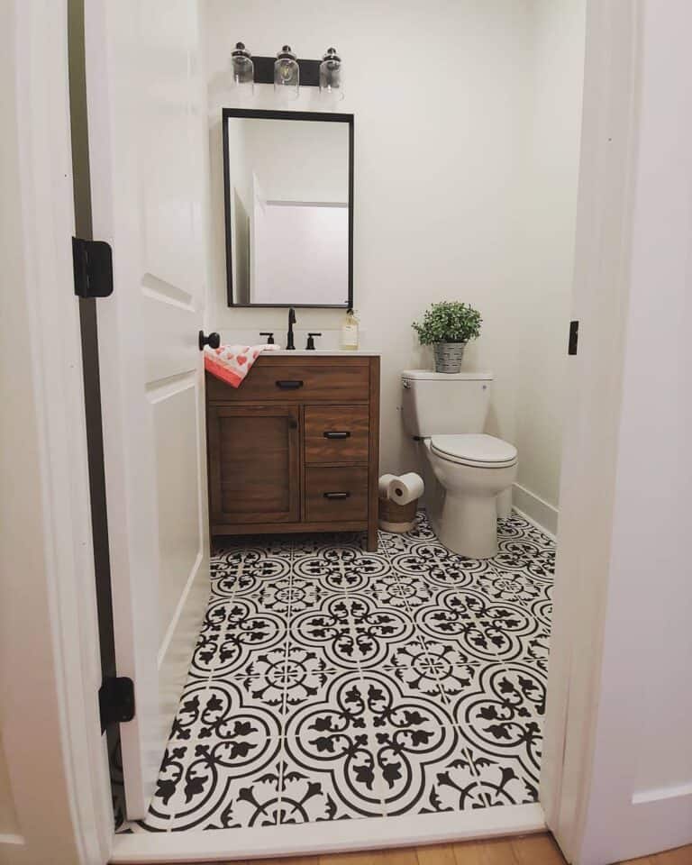 Black Accents Enhance a Farmhouse Bathroom