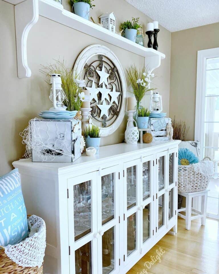 White Buffet With White and Blue Nautical Decorations