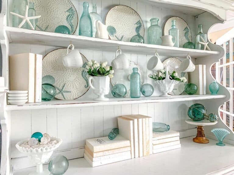 Coastal Decor Ideas With Blue Bottles and White Seastars