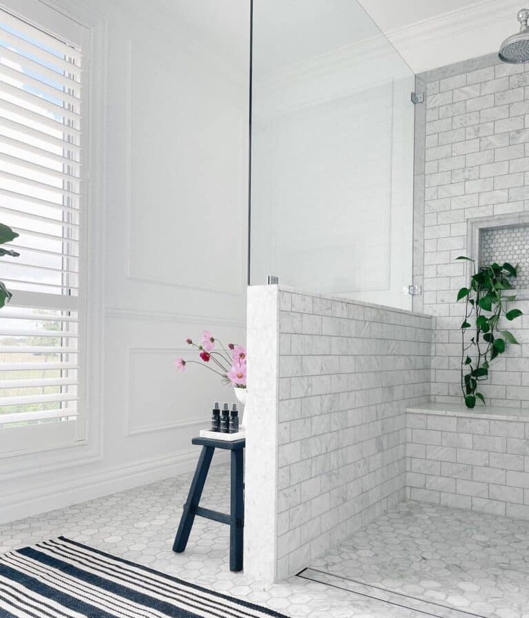 Marble Tile Bathroom with Modern Shower Bench