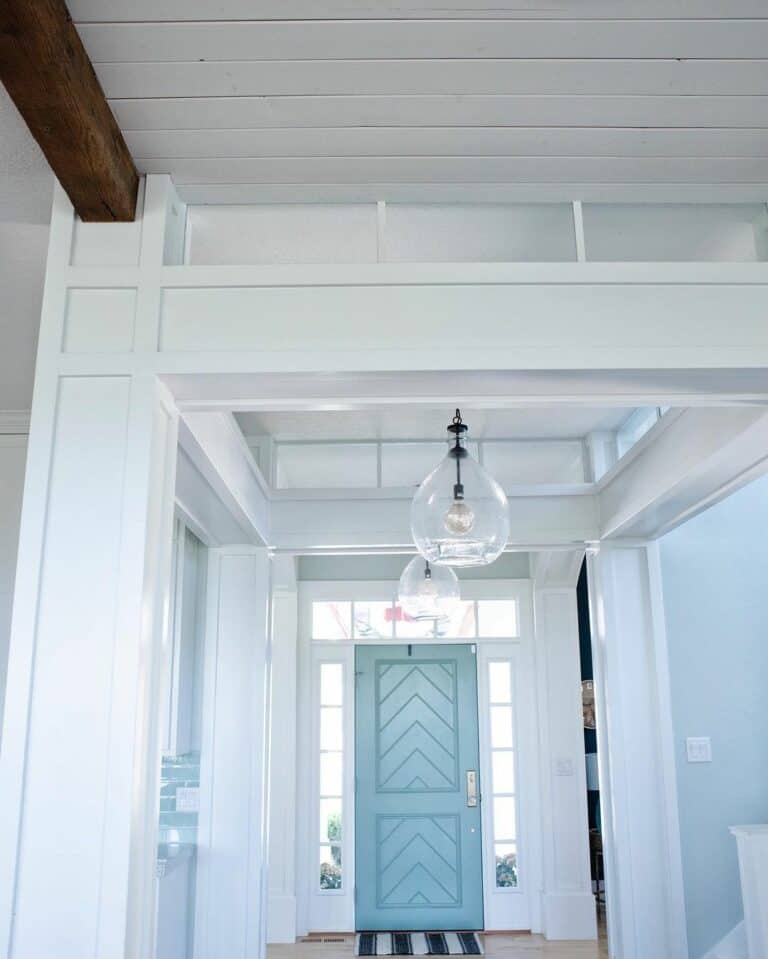 Vibrant Turquoise Door With Transom Window