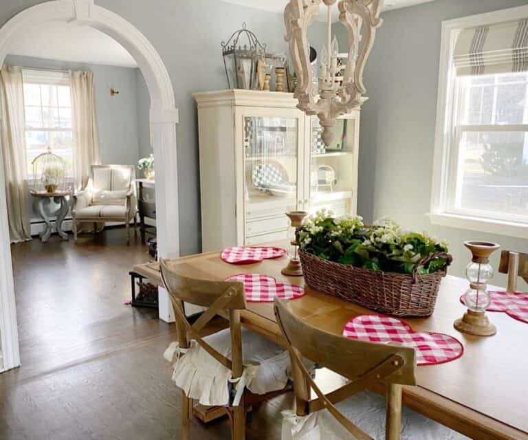 French Cottage Dining Table With a Floral Basket Centerpiece