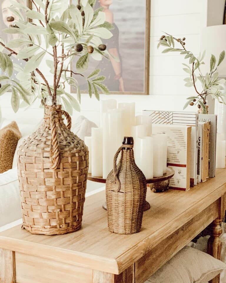 Wooden Sideboard With Books and Vases