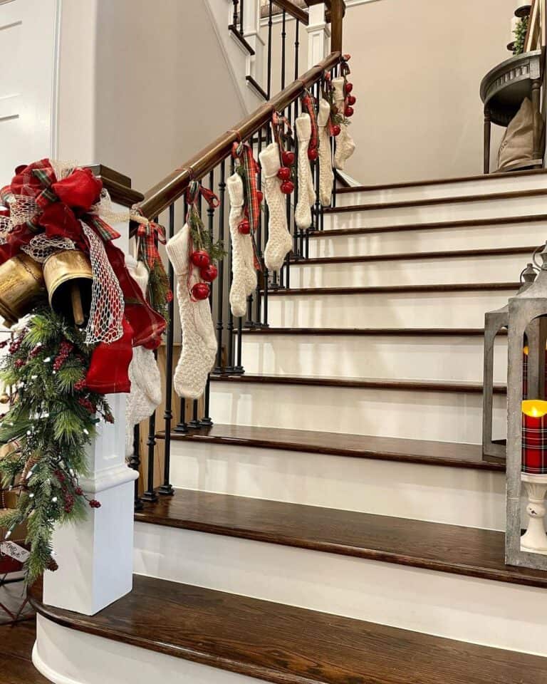 White Stockings with Red Bells on Ornate Staircase