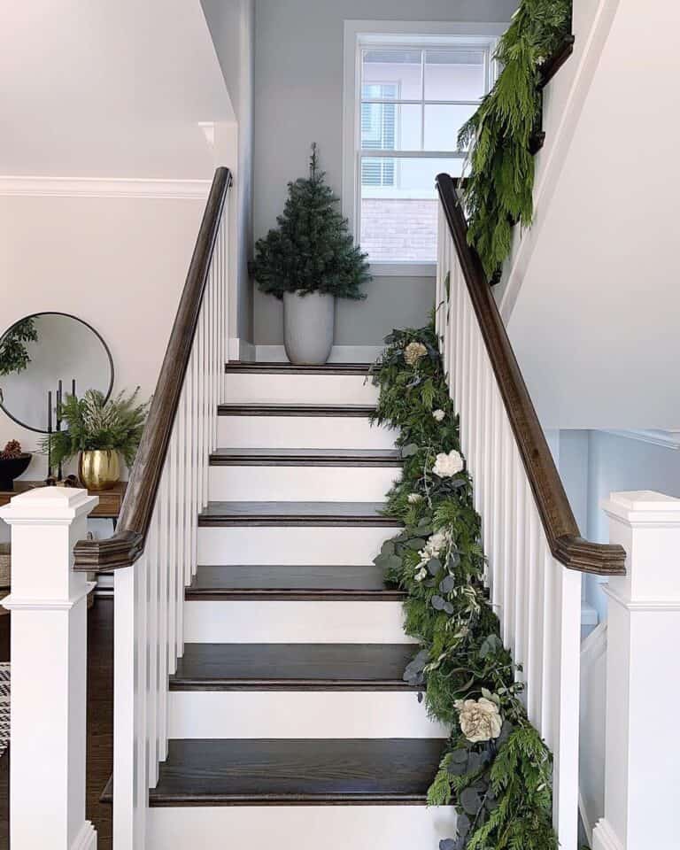 Garlands Draped Along Dark Wood Treads