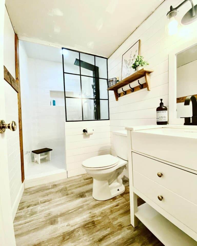 Rustic Farmhouse Bathroom With White Shiplap Walls