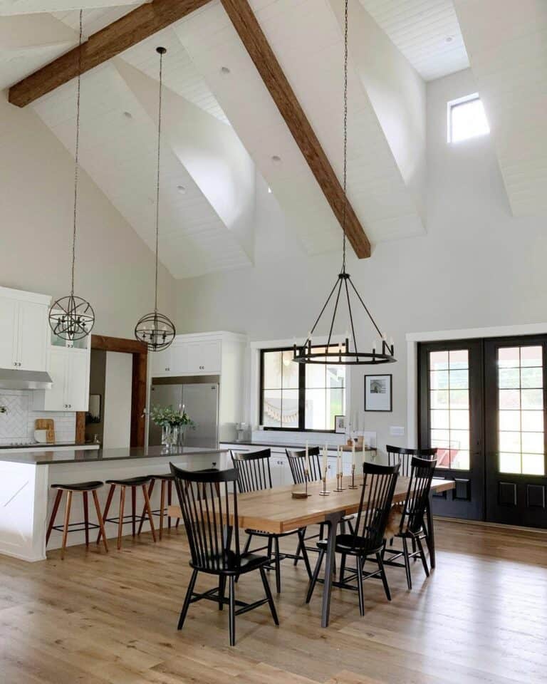 Wooden Dining Table With Black Spindle Chairs