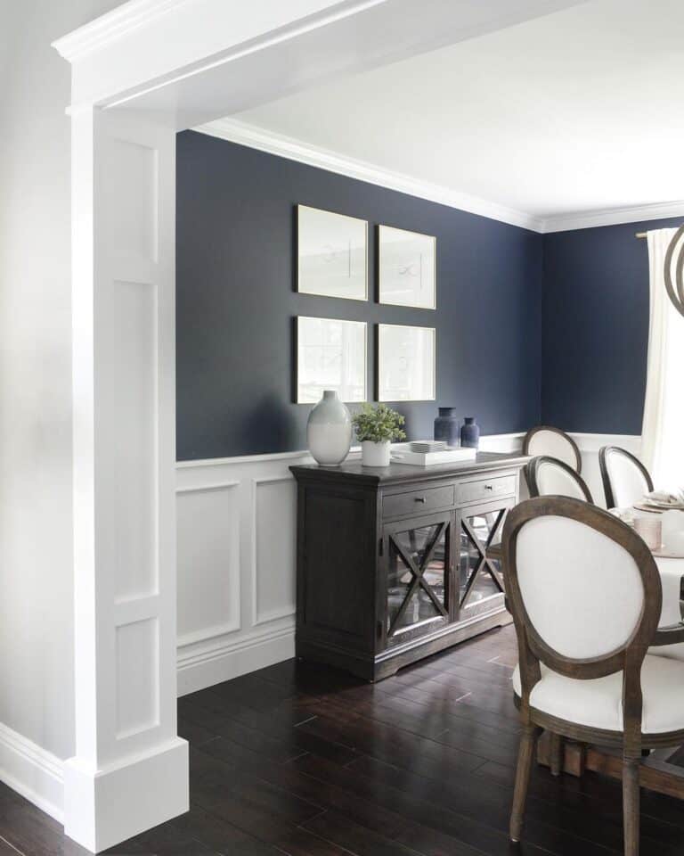 Navy Walls With White Dining Room Wainscoting